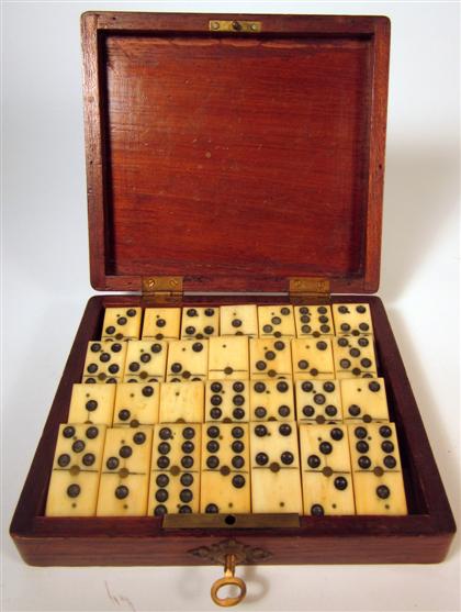 Appraisal: Complete set of Regency bone brass and ebony dominoes early