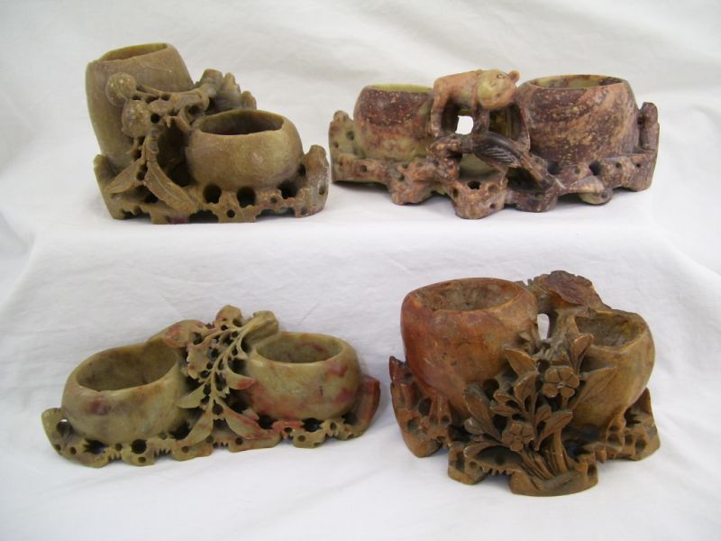 Appraisal: - Carved Soapstone Vase Groupings Lot includes Carved soapstone vase