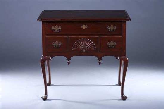 Appraisal: QUEEN ANNE STYLE MAHOGANY LOWBOY th Century Projecting notched-corner molded-edge