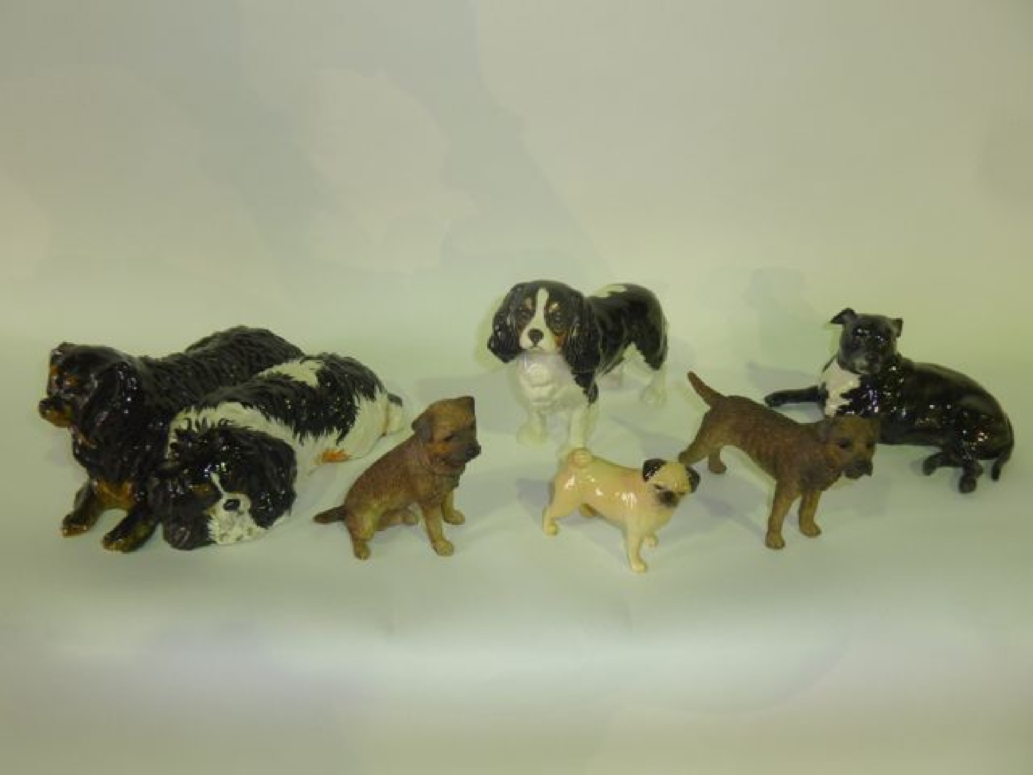 Appraisal: A collection of ceramic dogs including a Beswick example of