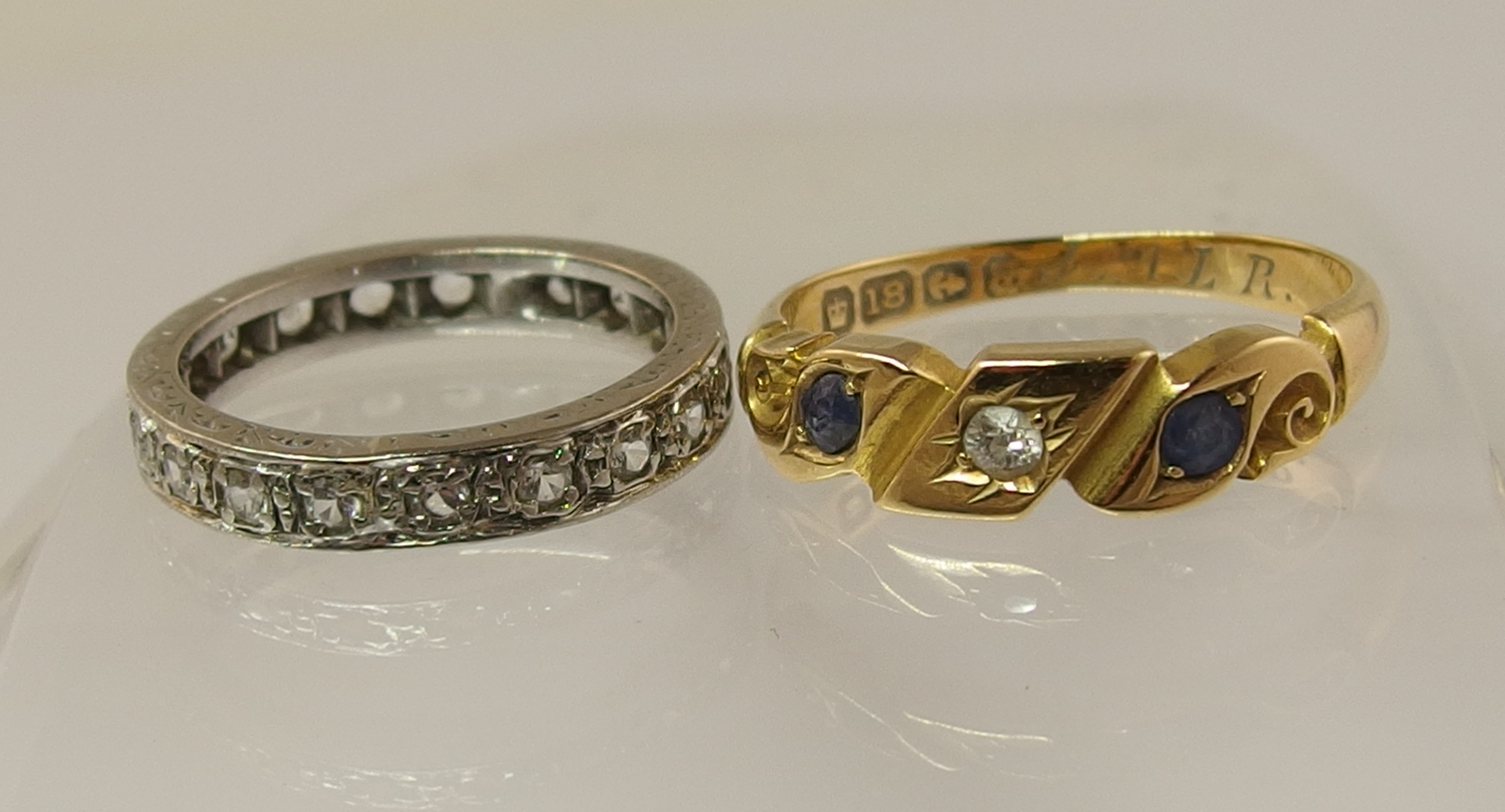 Appraisal: An ct white gold gem set full eternity ring and