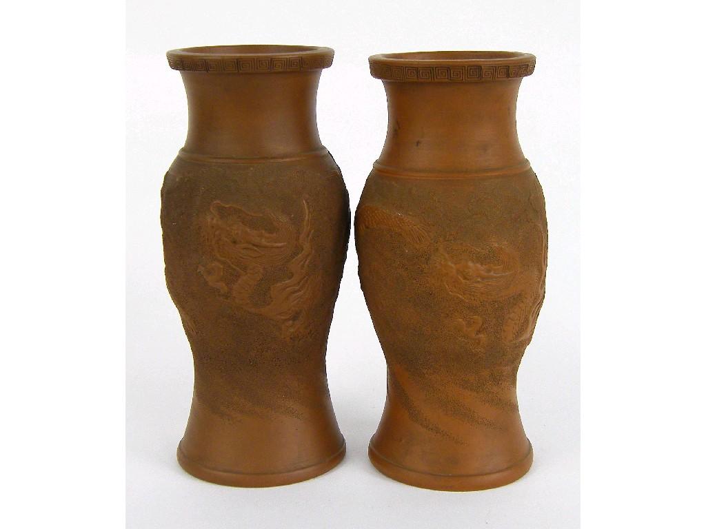 Appraisal: Pair of Chinese terracotta baluster vases decorated in relief with