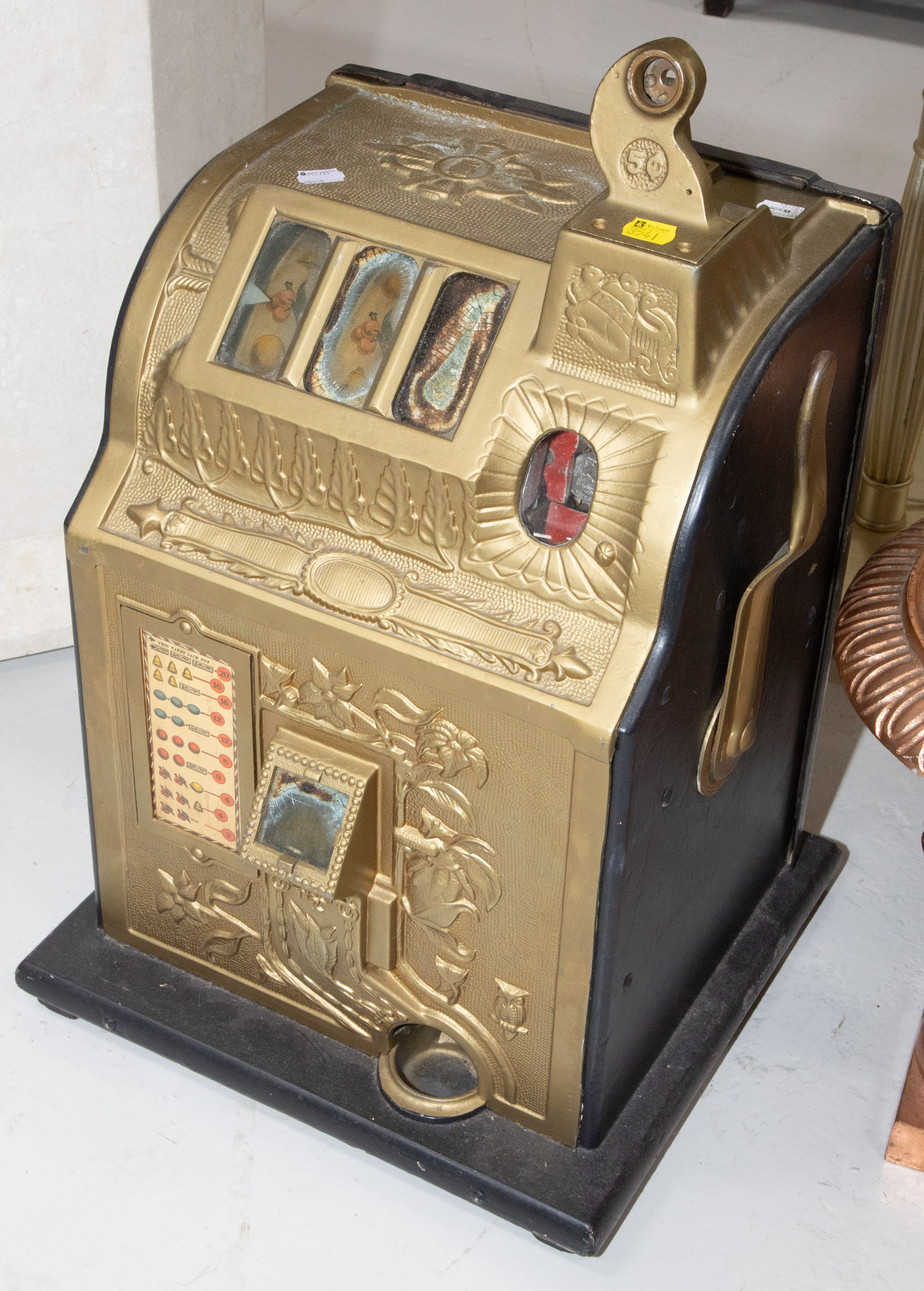 Appraisal: A VINTAGE FIVE CENT SLOT MACHINE First half th century