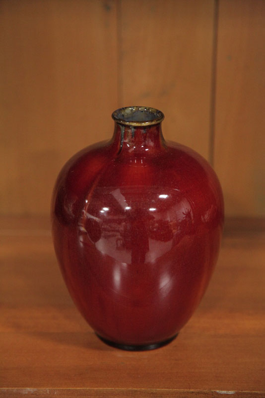 Appraisal: ROOKWOOD VASE Bulbous form having a deep red metallic glaze