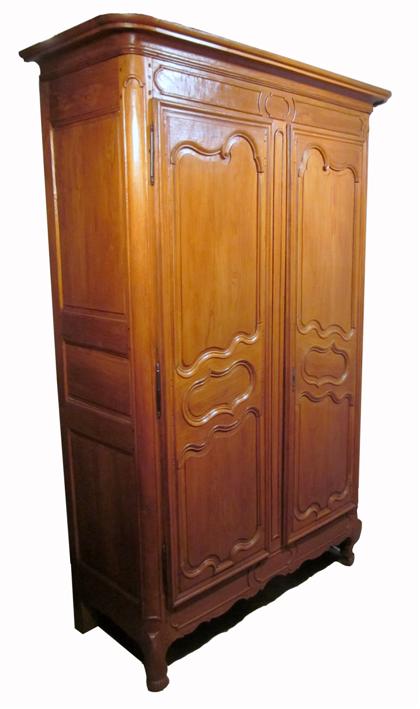 Appraisal: French provincial walnut armoire early th century