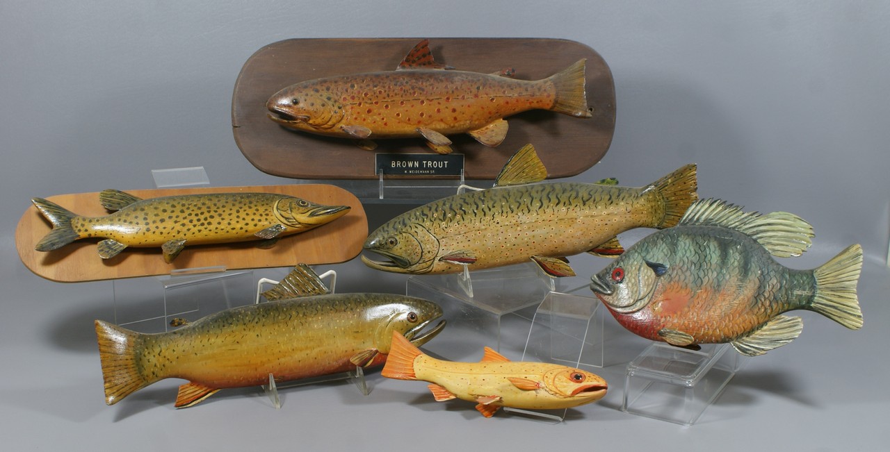 Appraisal: carved and painted wood fish wall hangers William C