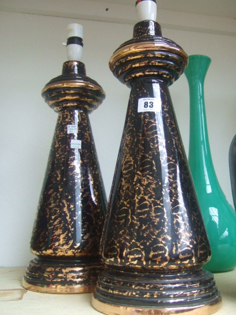 Appraisal: A pair of conical shaped pottery table lamps th century