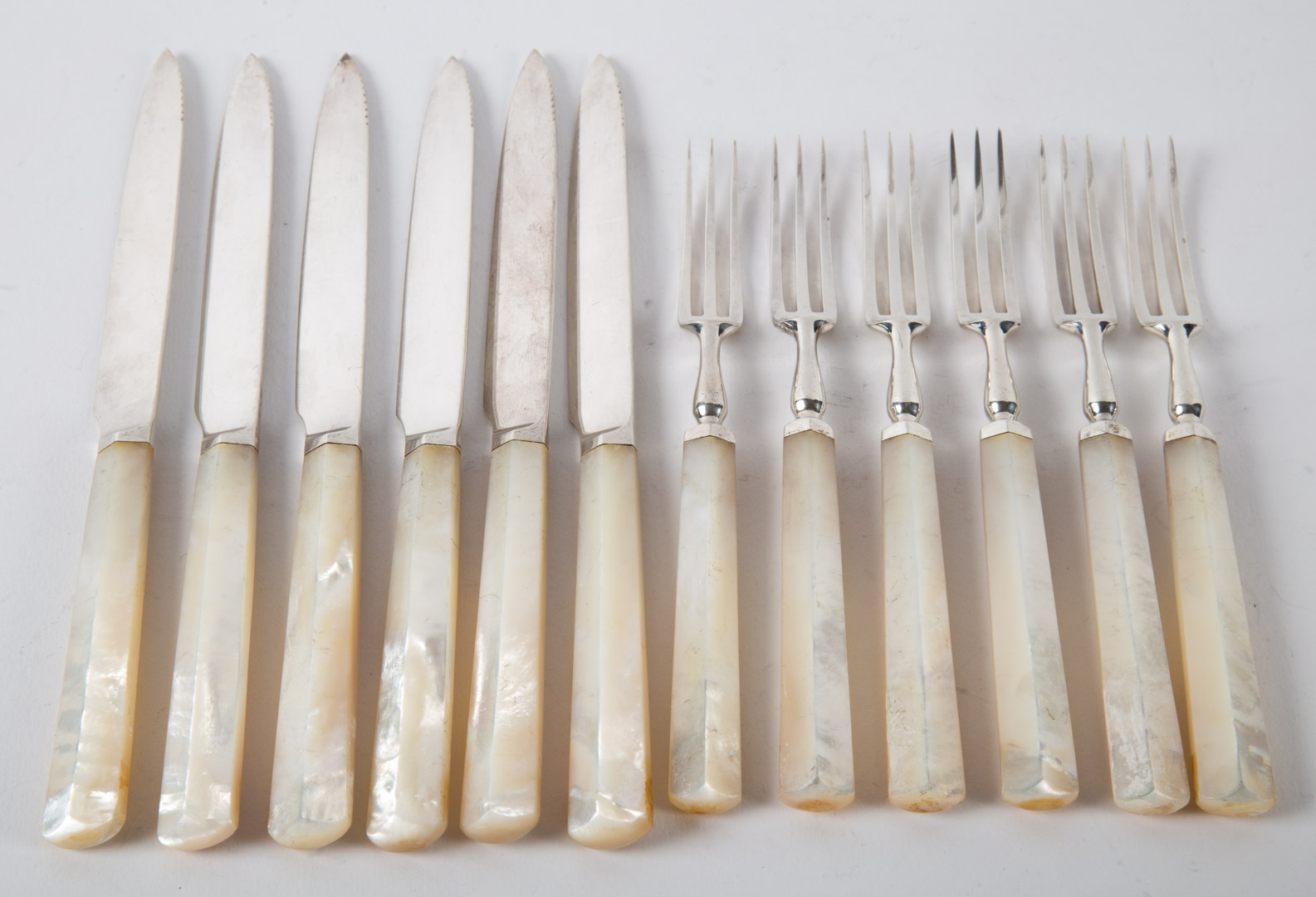 Appraisal: Mappin Webb pearl handled fruit knives forks set of six