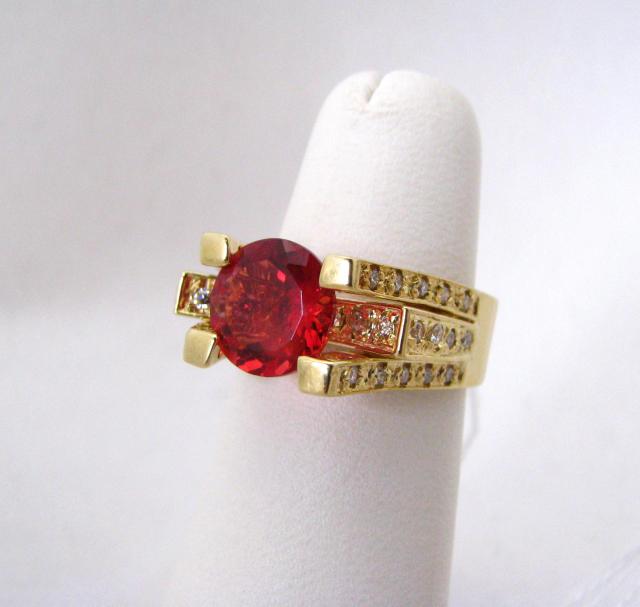 Appraisal: K yellow gold ring with ct red andesine center stone