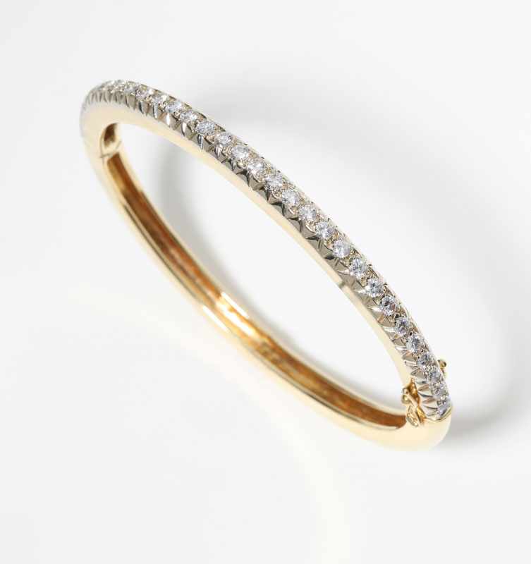 Appraisal: K yellow gold set with full-cut round diamonds totaling approximately