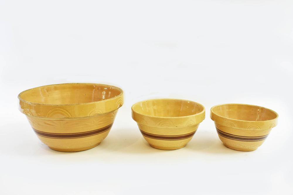 Appraisal: THREE 'S POTTERY MIXING BOWLSThree 's Pottery Mixing Bowls