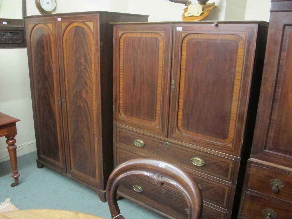 Appraisal: Sheraton style mahogany inlaid linen press on chest with a