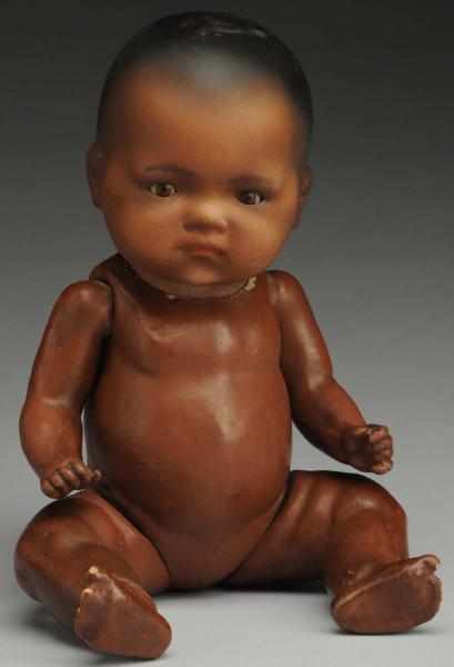 Appraisal: Pouty Black German Bisque Baby Doll Socket head incised A