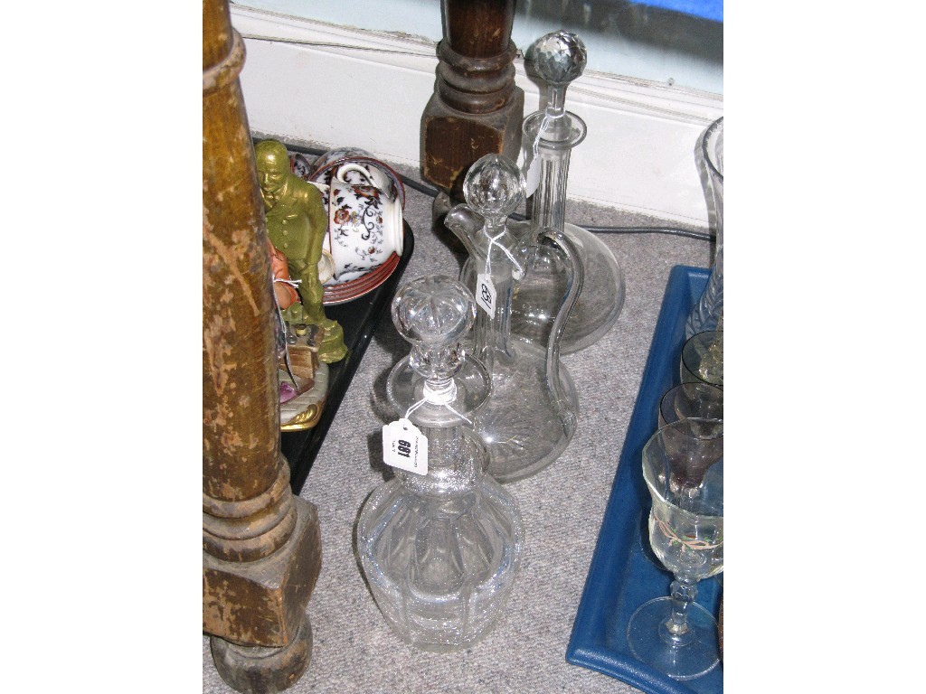 Appraisal: Lot comprising three cut glass decanters