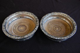 Appraisal: A PAIR OF GEORGIAN OLD SHEFFIELD PLATE WINE COASTERS