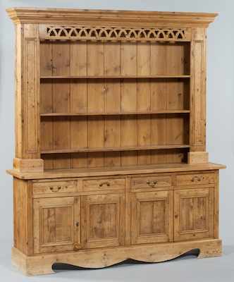 Appraisal: A Country Pine Welsh Cupboard A large rustically styled cupboard