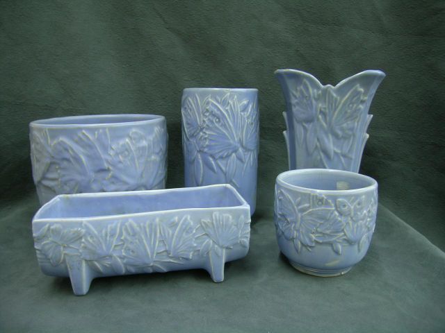 Appraisal: Five pieces of McCoy Butterfly Pottery including fan vase diameter