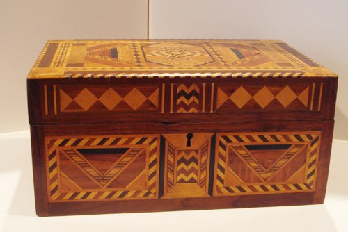 Appraisal: Artist Title Marquetry Box with geometric designs patterns velvet lining