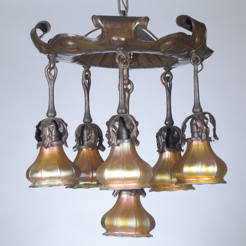 Appraisal: STEUBEN Hand-hammered copper chandelier with Steuben gold Aurene glass shades