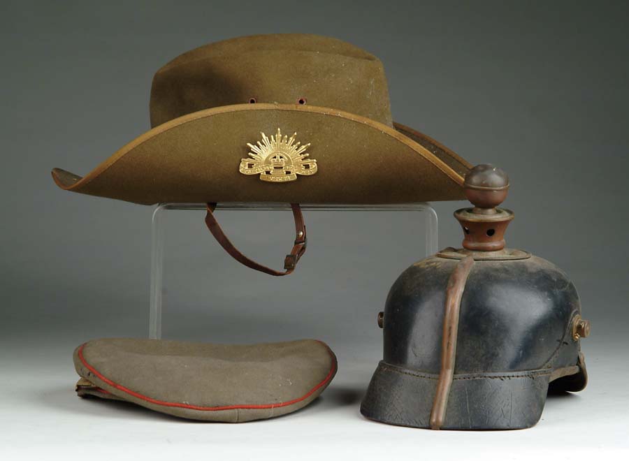 Appraisal: LOT OF FOUR STEEL HELMETS TWO PICKELHAUBE LEATHER GERMAN SPIKE