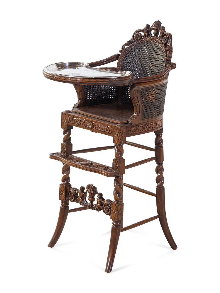 Appraisal: A Rococo Revival Carved Wood High Chair with a Fitted