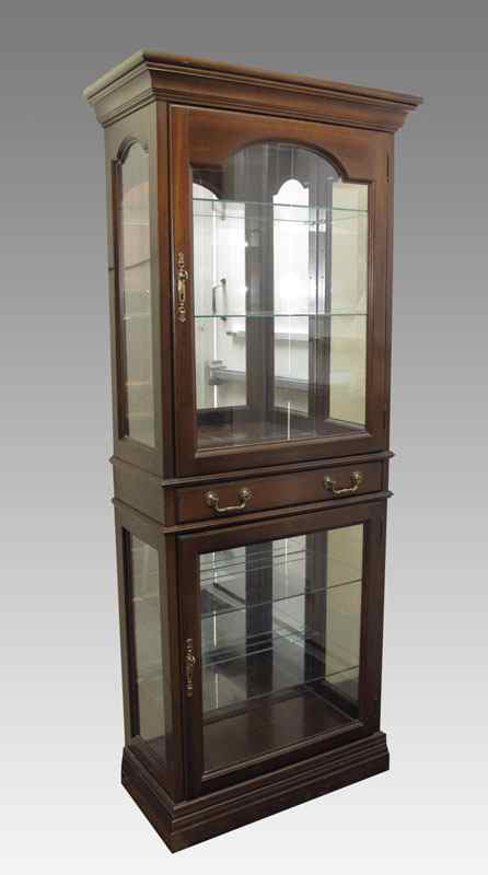 Appraisal: ILLUMINATED CHINA CURIO DISPLAY CABINET Illuminated upper and lower section