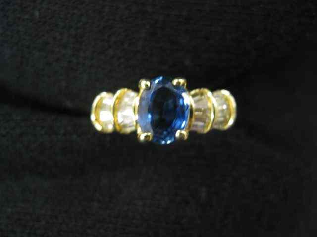 Appraisal: Sapphire Diamond Ring oval gems weighing carats surrounded by diamonds