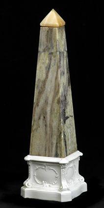 Appraisal: LARGE NEOCLASSICAL CARVED MARBLE OBELISK ON BERLIN PORCELAIN PEDESTAL The