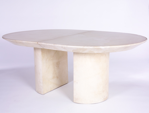 Appraisal: KARL SPRINGER Extension dining table with oval bevel-edged top on