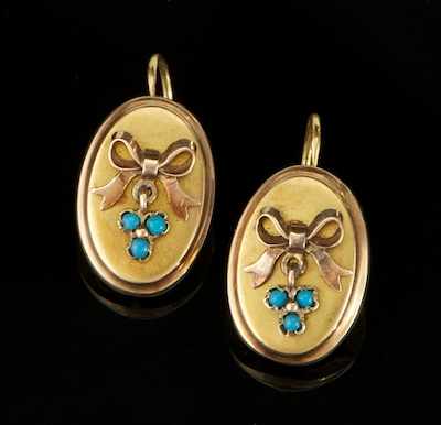 Appraisal: A Pair of Victorian Earrings ca Oval plaques with bow