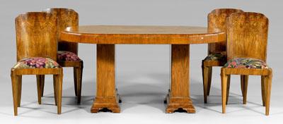 Appraisal: French Art Deco style table chairs dining table with figured