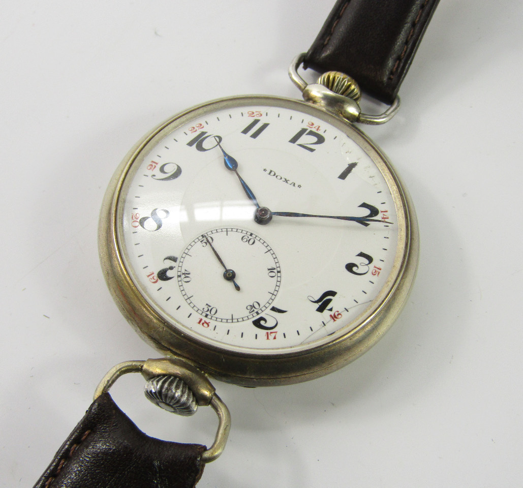 Appraisal: An early thC Doxa pocket wristwatch white enamel dial bearing