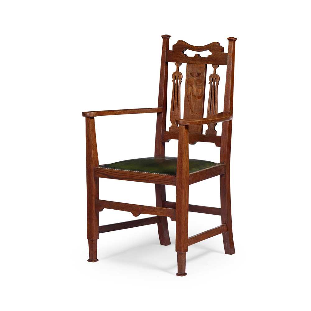 Appraisal: SHAPLAND PETTER BARNSTAPLE ARMCHAIR CIRCA inlaid oak with close-nailed leather