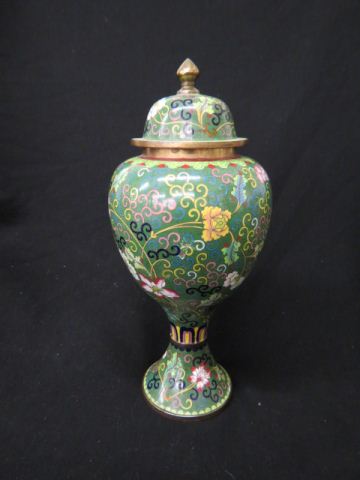 Appraisal: Chinese Cloisonne Covered Urn fancy floral on green field pedestal