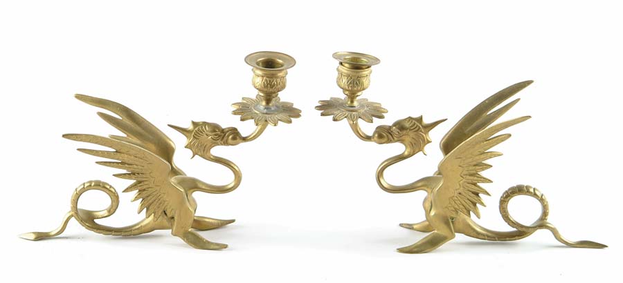 Appraisal: PAIR OF BRASS DRAGON CANDLESTICKS Figural dragon form holds candle