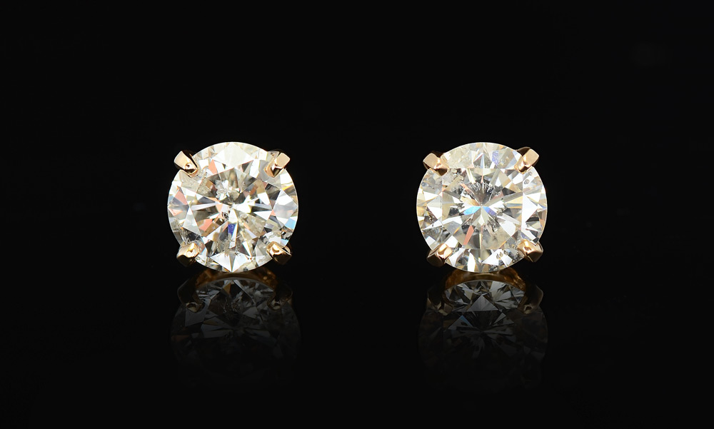 Appraisal: CT DIAMOND SOLITAIRE EARRINGS K yellow gold earrings of round