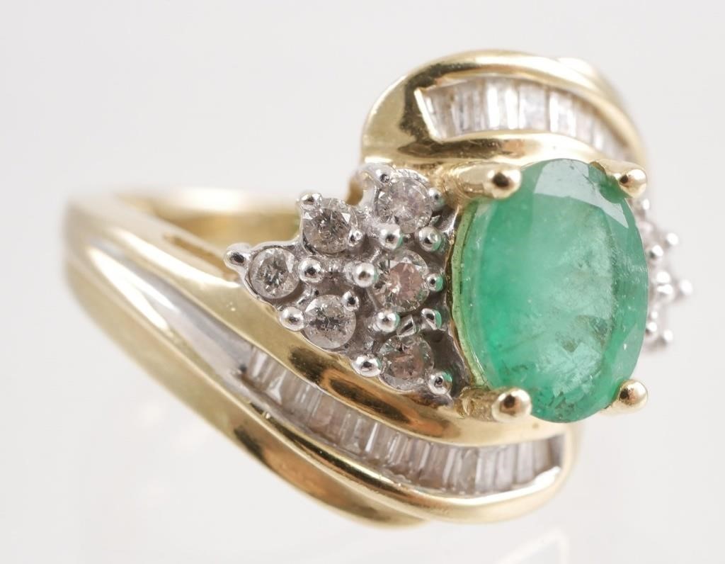 Appraisal: One carat oval emerald flanked by round and baguette diamonds