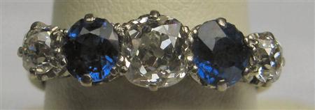 Appraisal: An ct white gold five-stone sapphire and diamond ring alternately