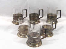 Appraisal: Six silver plated tea glass holders with glasses circa