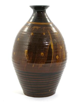 Appraisal: Michael Leach - an earthenware slip decorated vase impressed ML