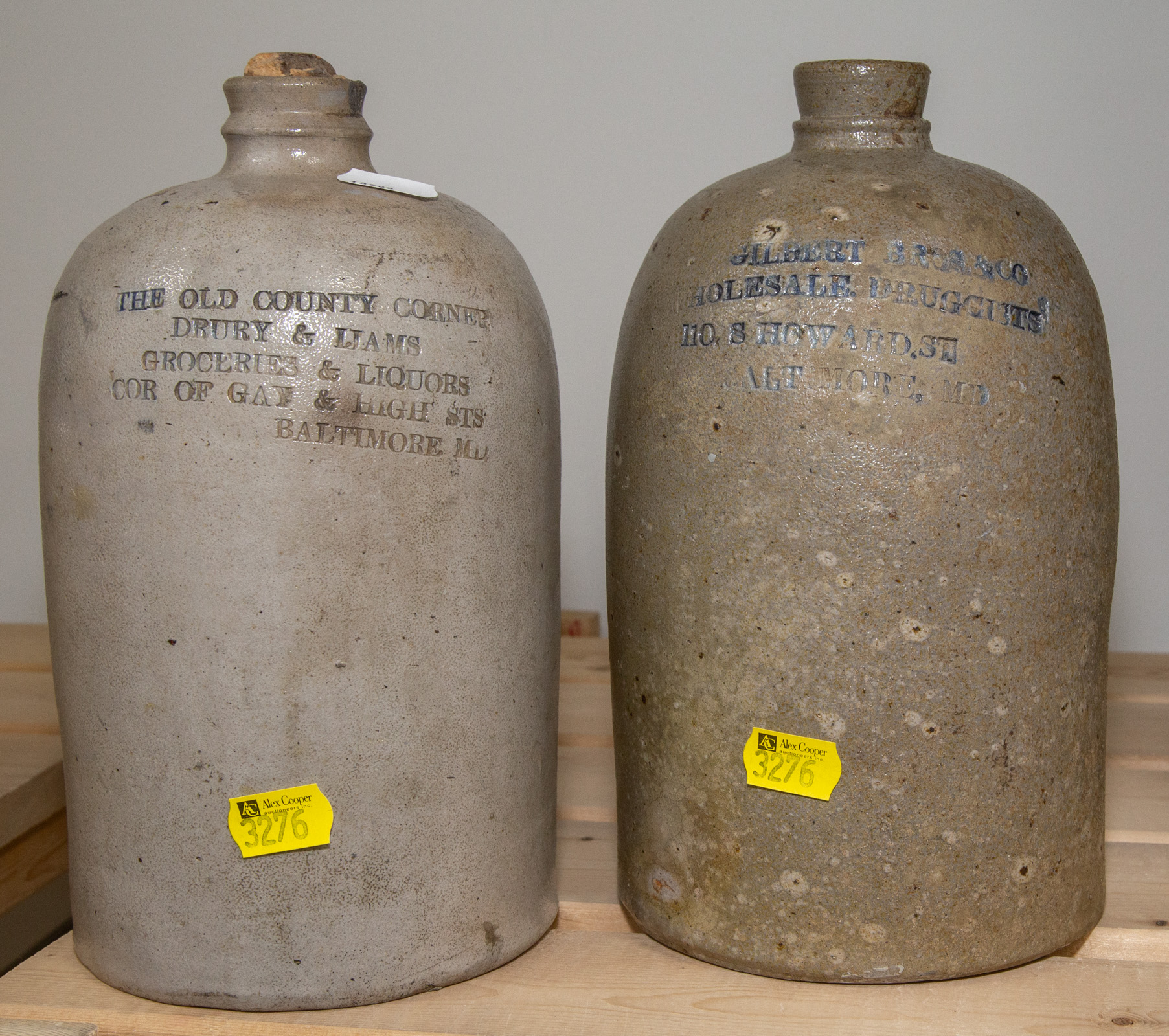 Appraisal: TWO BALTIMORE LABELED STONEWARE JUGS Includes THE OLD COUNTY CORNER