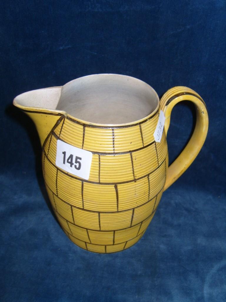 Appraisal: An early th century yellow glazed jug of ribbed moulded