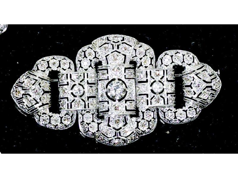 Appraisal: PLATINUM BROOCH Art Deco style set with seventy seven diamonds