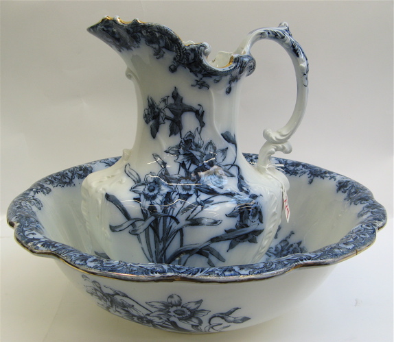 Appraisal: DOULTON BURSLEM PORCELAIN BOWL AND PITCHER SET Daffodil pattern blue