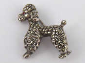 Appraisal: A French hallmarked silver and marcasite brooch designed as a