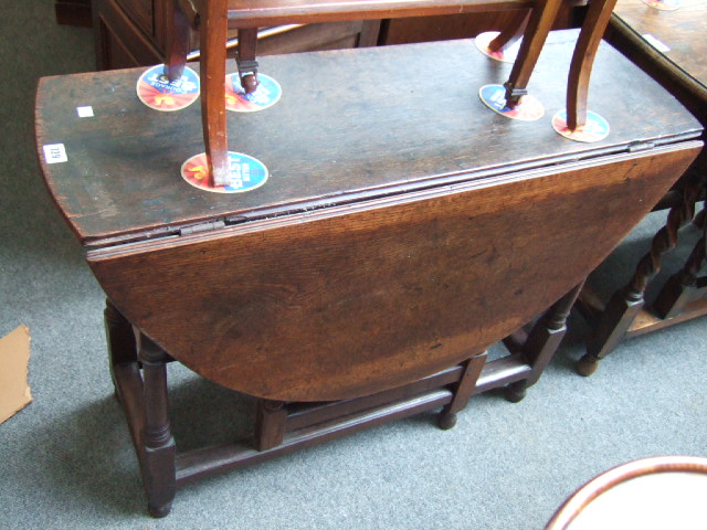 Appraisal: A mid th century gateleg table with oval top and