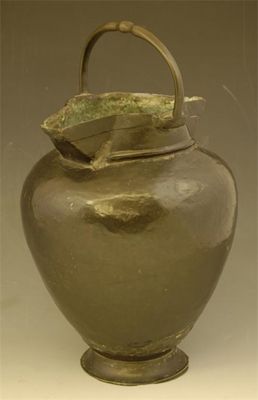 Appraisal: A bronze ewer of ovoid form with twin spouts and