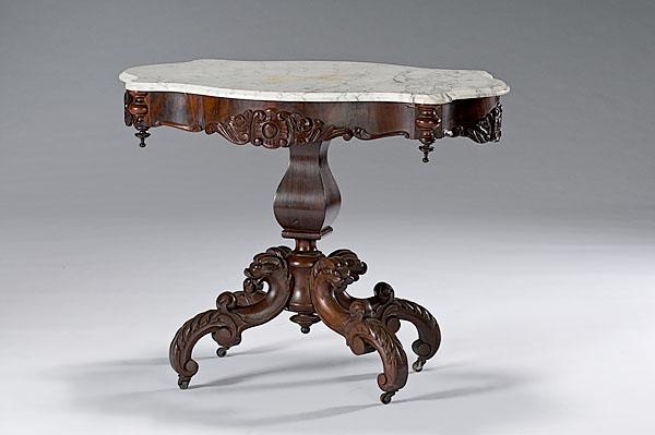 Appraisal: MARBLE-TOP CENTER TABLE WITH GRIFFINS American ca - in mahogany