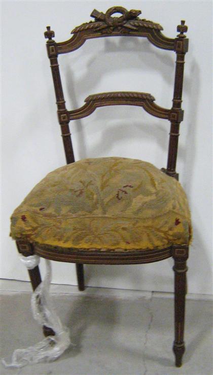 Appraisal: French giltwood and needlework ballroom chair The chair rail centered