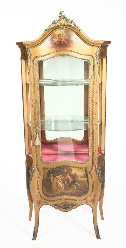 Appraisal: CURIO CABINET French style with serpentine front Gilt finish with